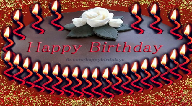 Lighted candles , birthday card